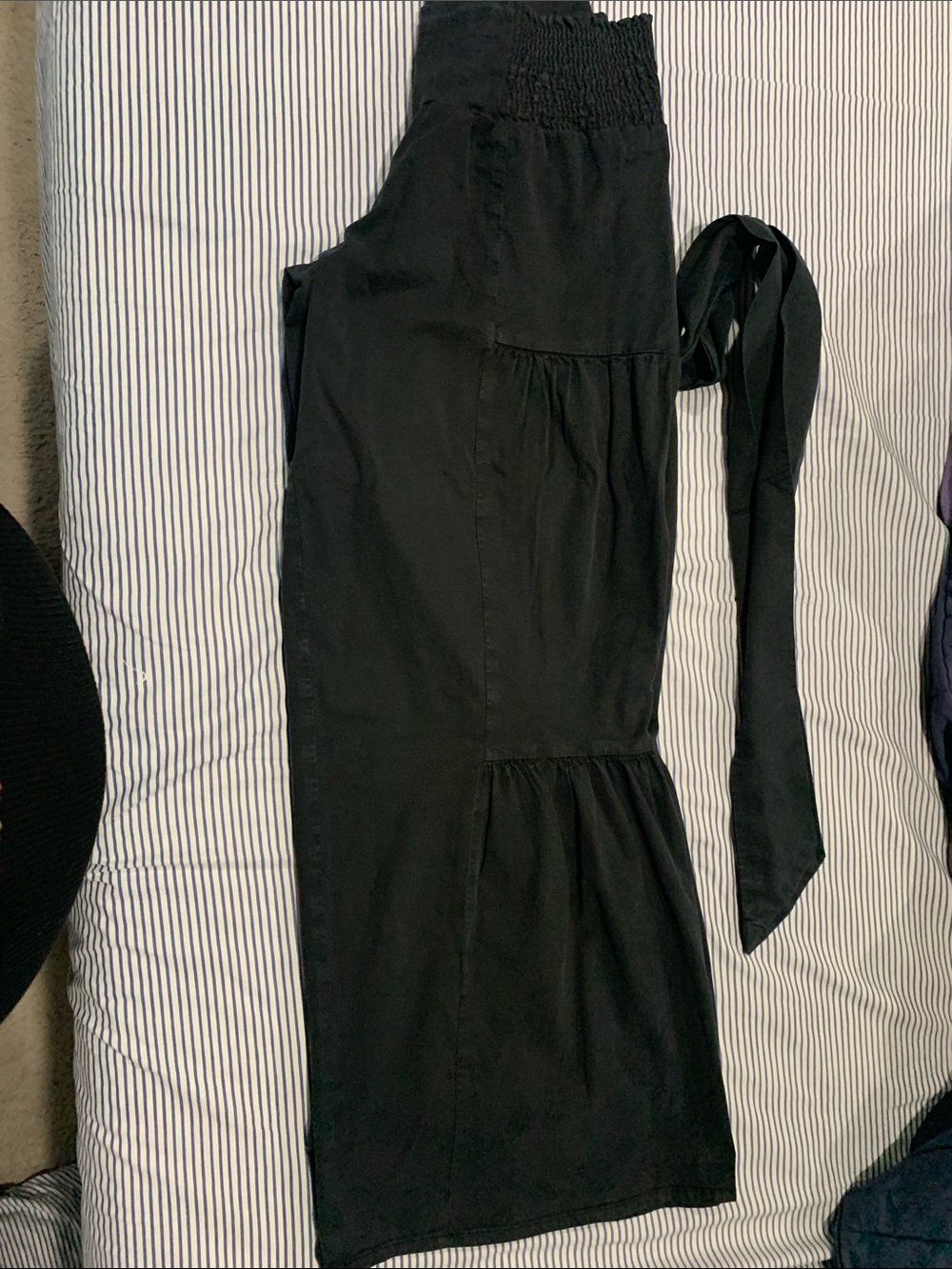 Black Wide-Leg Tiered pants with Smocked waistband and attached Waist Tie